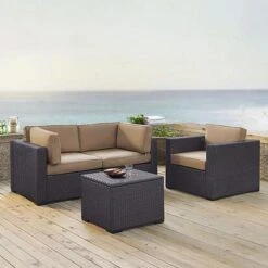Crosley - Biscayne 4 Piece Wicker Set With Mist Cushions - Two Corner Chairs, Arm Chair & Coffee Table